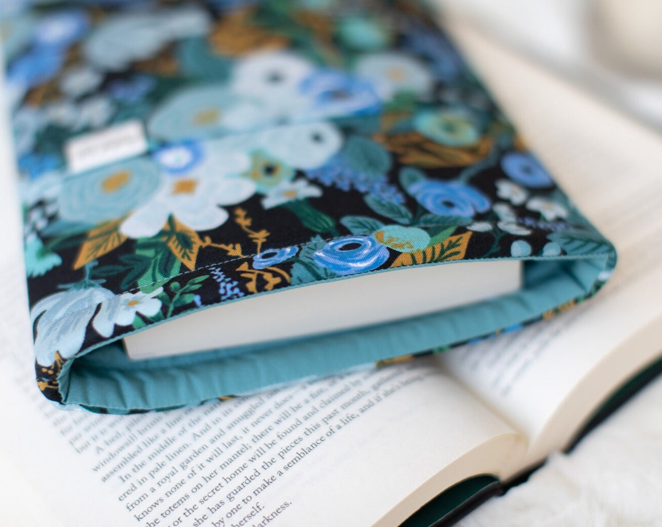 Coordinating cotton blue lining of book sleeve closeup